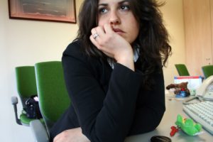 2302-sitting-at-desk